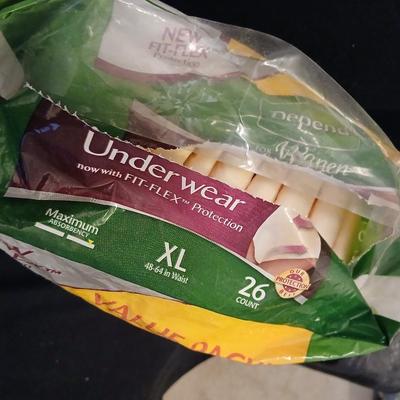 Women's Depends XL and L both opened but full