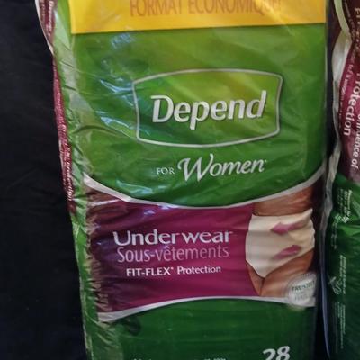 Women's Depends XL and L both opened but full