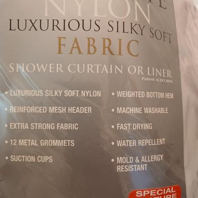 Bath rugs small trash can and towel rack with brand new shower curtain liner