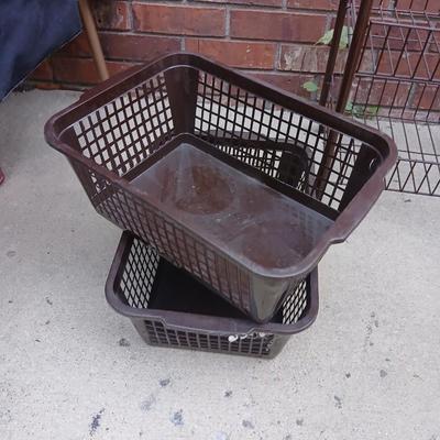 Small two shelf organizer basket with brown crates and storage containers