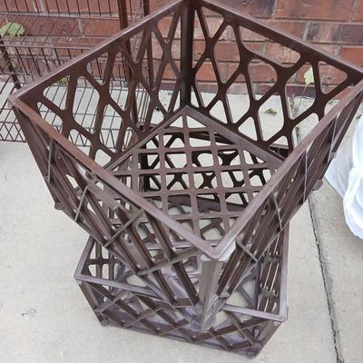 Small two shelf organizer basket with brown crates and storage containers
