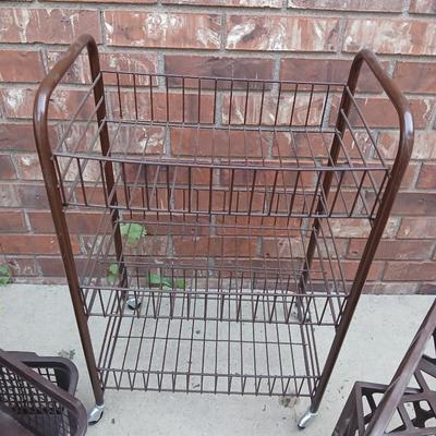 Small two shelf organizer basket with brown crates and storage containers