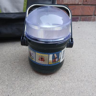 Hiking backpack with drinking cooler and a flashlight