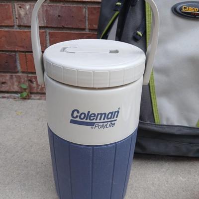 Hiking backpack with drinking cooler and a flashlight