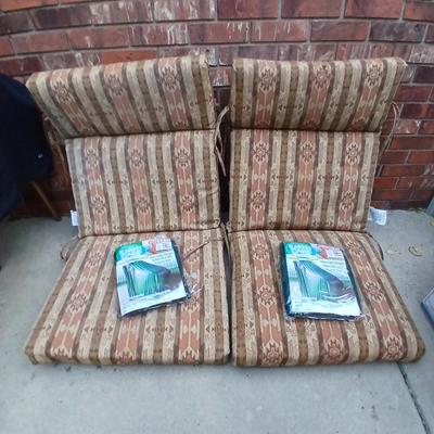 Two southwest print patio chair cushions with chair covers