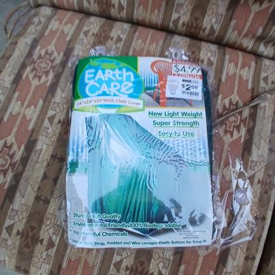 Two southwest print patio chair cushions with chair covers