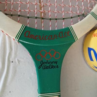 Tennis Raquet, tennis balls and a pair of hand weights