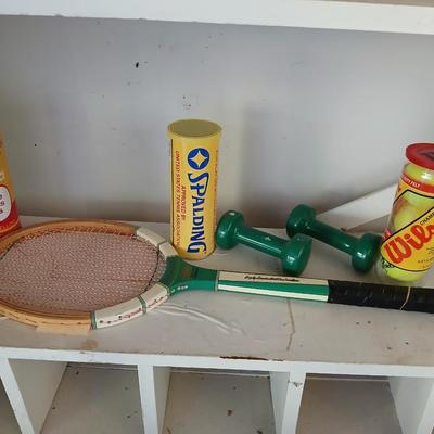 Tennis Raquet, tennis balls and a pair of hand weights
