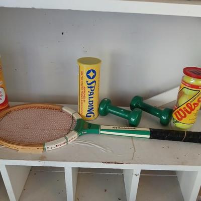 Tennis Raquet, tennis balls and a pair of hand weights