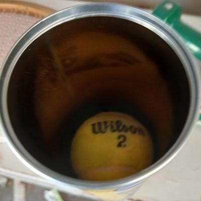 Tennis Raquet, tennis balls and a pair of hand weights