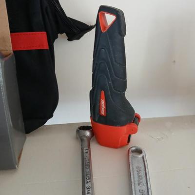 Tool bag with an assortment of tools, Craftsman screwdriver, small screwdriver set, skill screwdriver, a flashlight and more