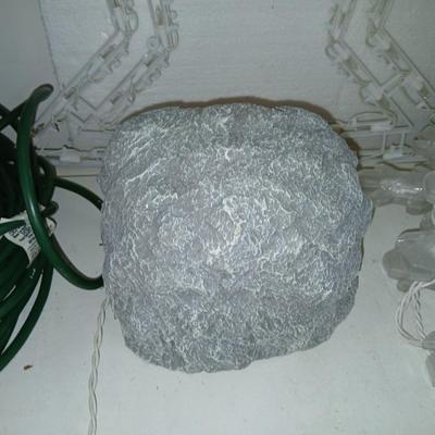 Outdoor Christmas decorations snowflake lights with star an extension cord and a faux hide a cord rock in tote