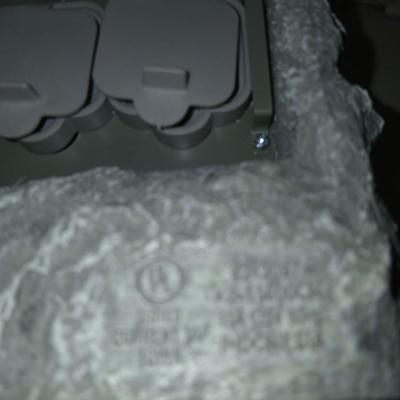 Outdoor Christmas decorations snowflake lights with star an extension cord and a faux hide a cord rock in tote