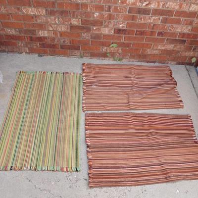 Three fabric throw rugs