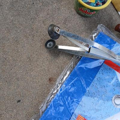 Gardening hand tools, gloves, tarp with a canvas bag and more