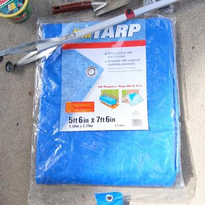 Gardening hand tools, gloves, tarp with a canvas bag and more