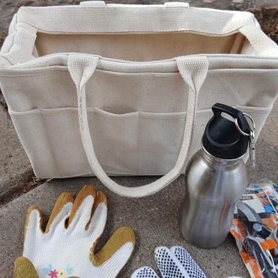 Gardening hand tools, gloves, tarp with a canvas bag and more