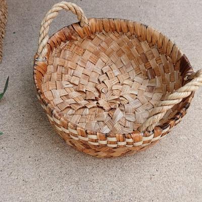 Faux Bamboo in basket with faux purple flowers