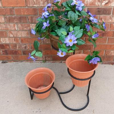 Wrought Iron plant stand with faux purple flowers and two pots