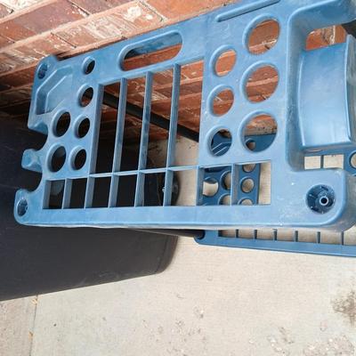 Wheeled trashcan with lid and a yard tool organizer