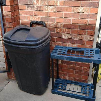 Wheeled trashcan with lid and a yard tool organizer