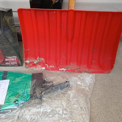 Your gonna need these soon! Snow shovels, partial bags of ice melt and a Ice carpet