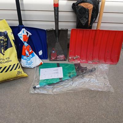 Your gonna need these soon! Snow shovels, partial bags of ice melt and a Ice carpet