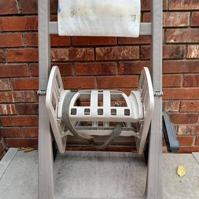Patio storage box and a hose reel