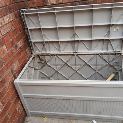 Patio storage box and a hose reel