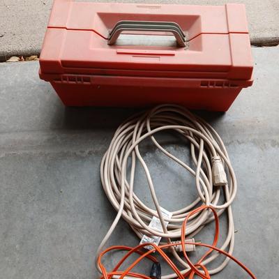 Plastic toolbox with extension cords Electrical hand tools and plugs