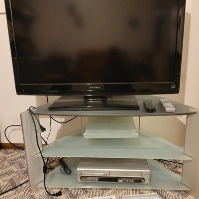 42" dynex TV, magnavox dvd/vvcr combo and stand