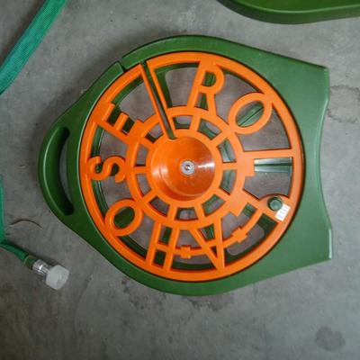 Two hose reels and a hose