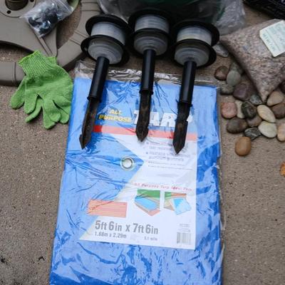 USA Flag on pole, Compost, a new tarp and a few misfit garden items