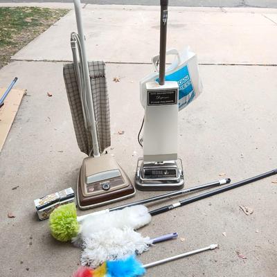 Vintage vacuum, floor polisher, and some nice newer dusters