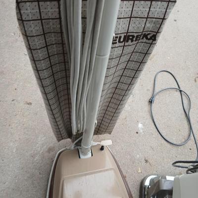 Vintage vacuum, floor polisher, and some nice newer dusters