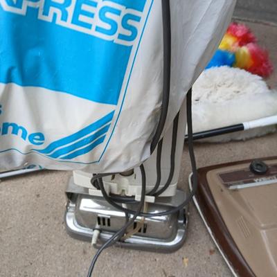Vintage vacuum, floor polisher, and some nice newer dusters