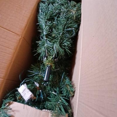 Faux 6' pre lit Christmas tree Spencer pine with decorations and other Christmas ornaments