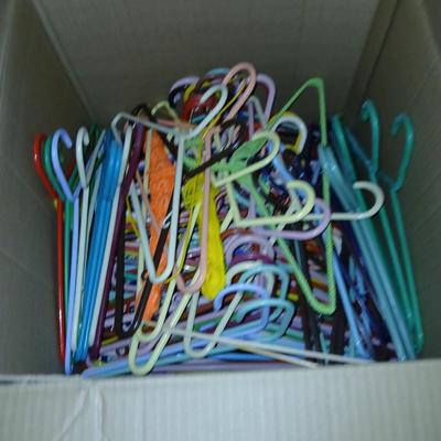 HUGE box of clothes hangers, you should never need another and will have some to share!