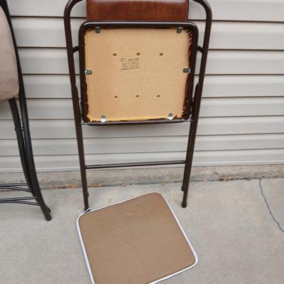 Two folding chairs with pads and a new folding bar stool