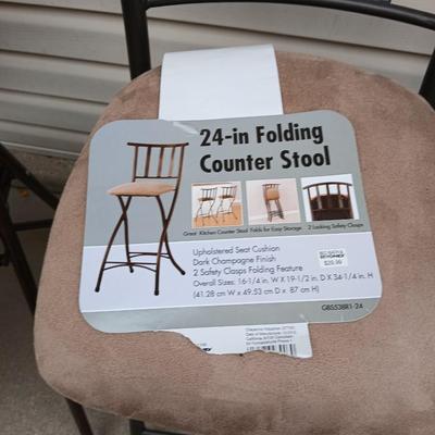 Two folding chairs with pads and a new folding bar stool