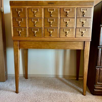 Sale Photo Thumbnail #28: Gaylord Bros refinished oak card catalogue with 15 smooth-sliding drawers, all original. Hand refinished and in excellent condition aside from minor blemishes on the top as shown, it was repurposed to store cassettes.  So many creative uses if drawer bott