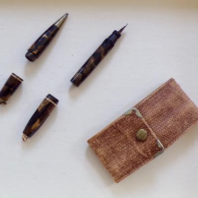 Sale Photo Thumbnail #37: Used writing set with one pendant fountain pen and one pendant ball-point style pen in a snapping snakeskin pouch. Cartridges are not included.