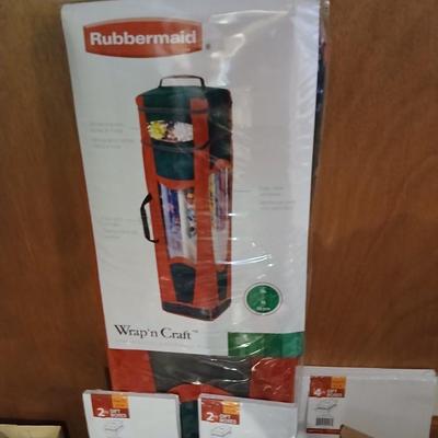 Rubbermaid Wrap n craft storage container with lots of wrapping supplies