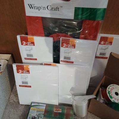 Rubbermaid Wrap n craft storage container with lots of wrapping supplies