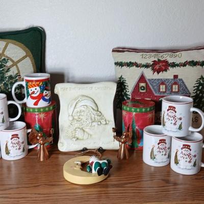 Christmas throw pillows, Mugs, copper-colored angels, plaque and more