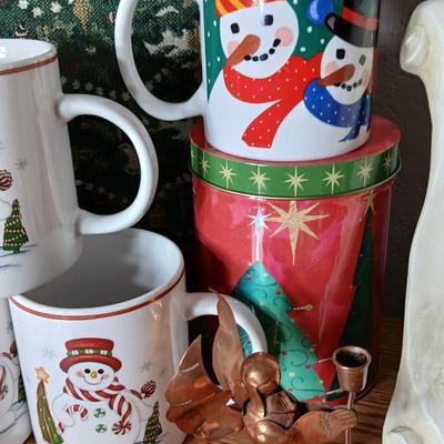Christmas throw pillows, Mugs, copper-colored angels, plaque and more