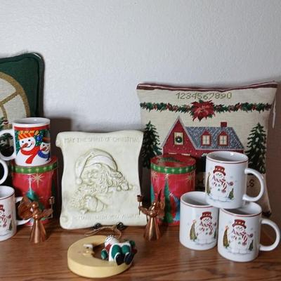 Christmas throw pillows, Mugs, copper-colored angels, plaque and more