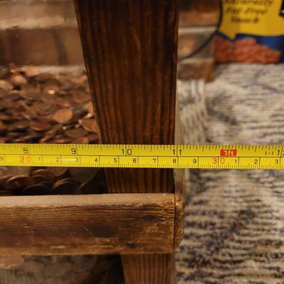 Deet rock water Co crate and big jar of pennies