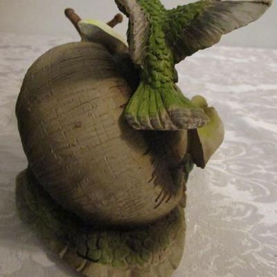 Snail and hummingbird sculpture