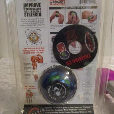 Dynaflex Pro sports gyro exerciser and 5 lb weight